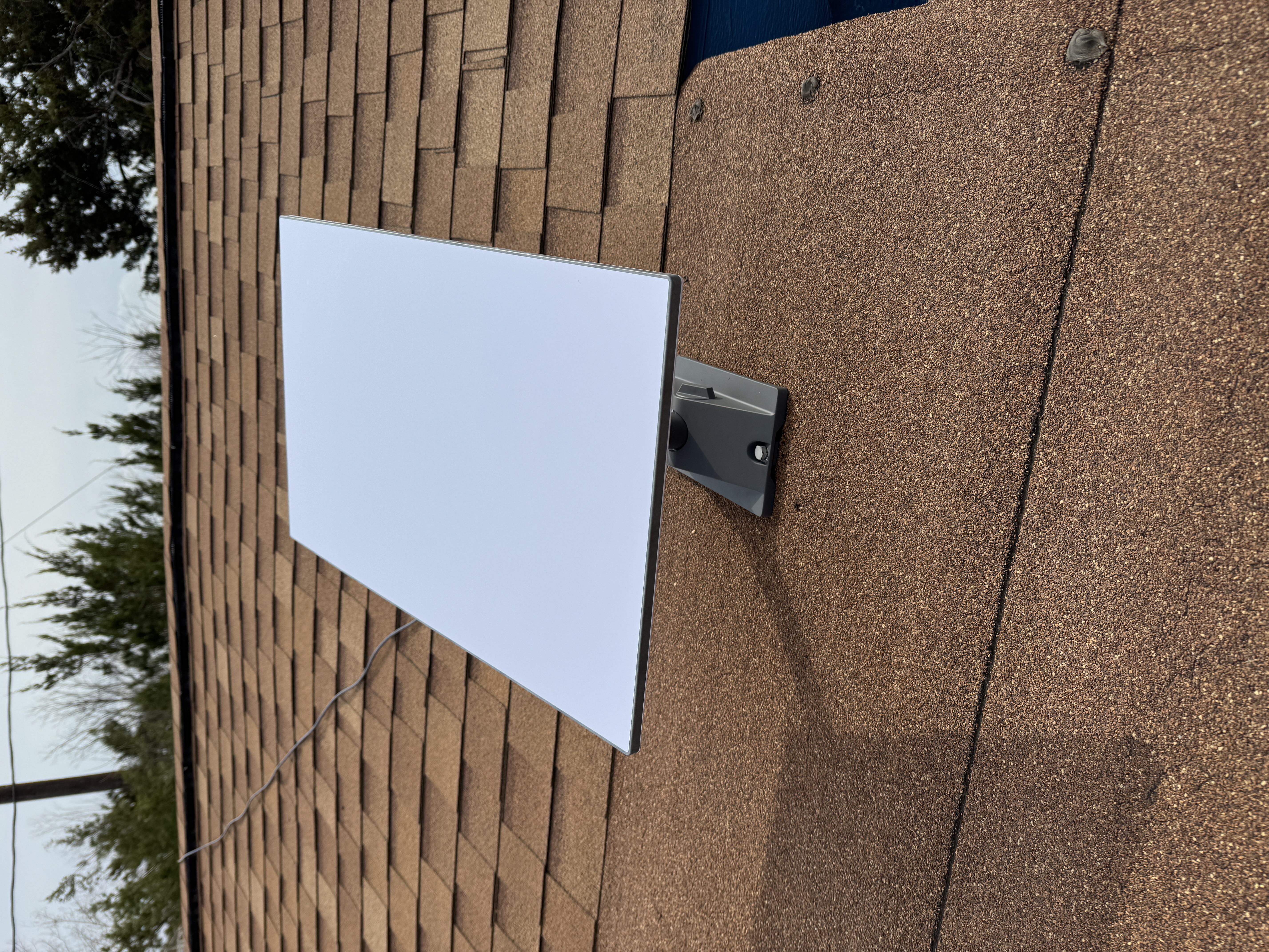Starlink dish mounted on rooftop